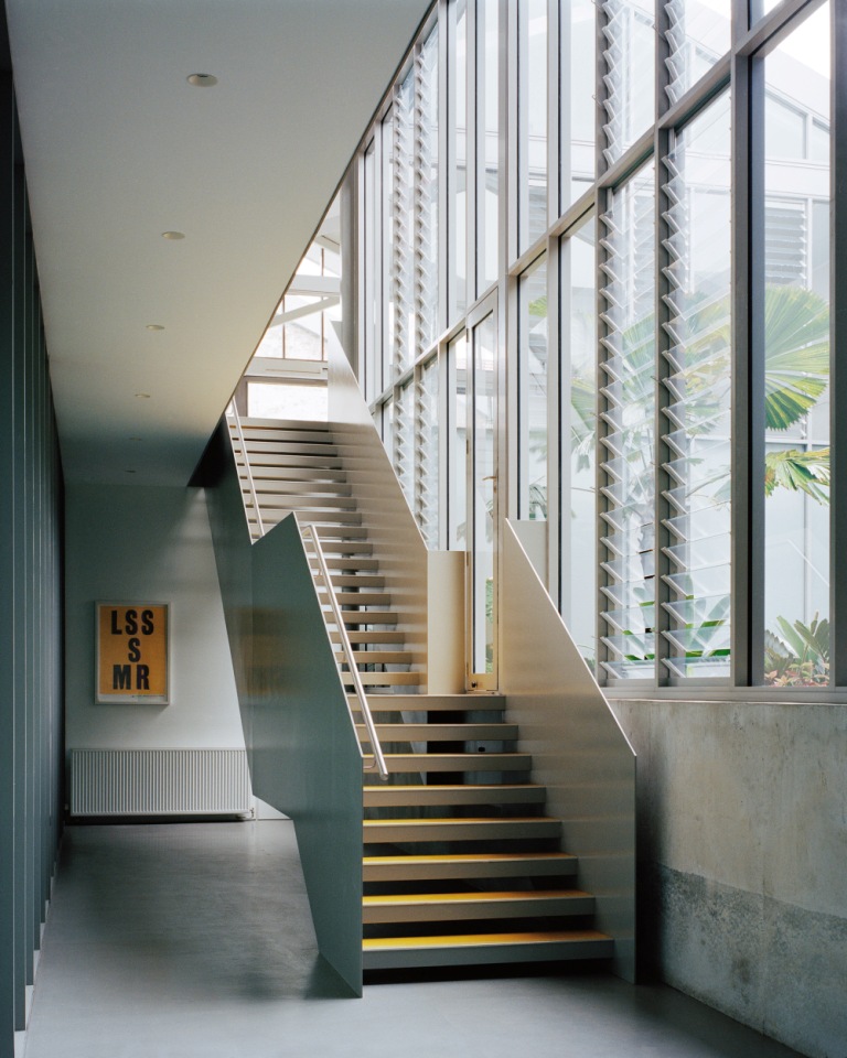 Elegant stairway inside the Redfern Warehouse using Breezway Louvres